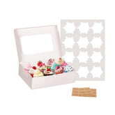 Yeplan cupcake boxes with window displaying pastries in transit