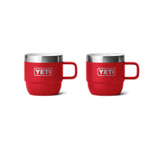 YETI Rambler 6 oz stackable mug in Rescue Red resting on table.