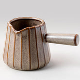 YHOJOY espresso cup with handle for stable, controlled pours.