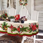 Yighty oval Christmas tablecloth with poinsettia motif adds festive elegance to holiday dining.