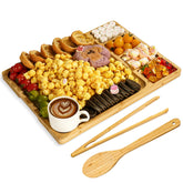 Zenxylo charcuterie board with tongs highlights four-compartment display for cheeses and fruits.