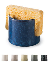 Zoeeker ceramic sponge holder in blue keeps the sink organized and stylish.