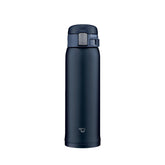 Zojirushi direct drinking mug with one touch open for quick access.