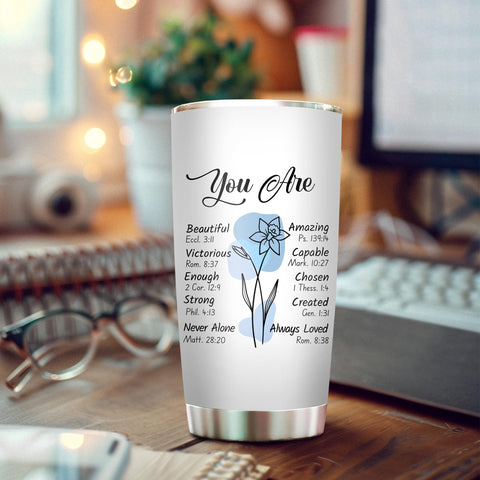 2IMT tumbler with sliding lid prevents leaks during travel.