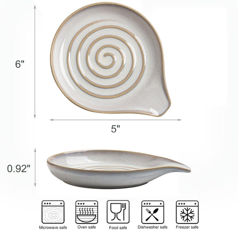 Cormomu spoon rest with swirl motif and reactive glaze for stylish kitchen decor.
