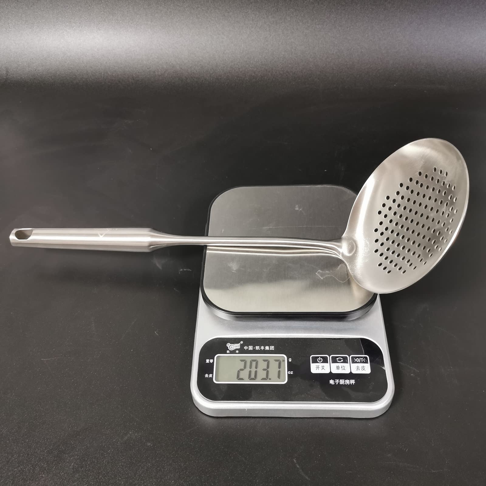 A · HOUSEWARE Skimmer easy-clean dishwasher-safe kitchen tool.