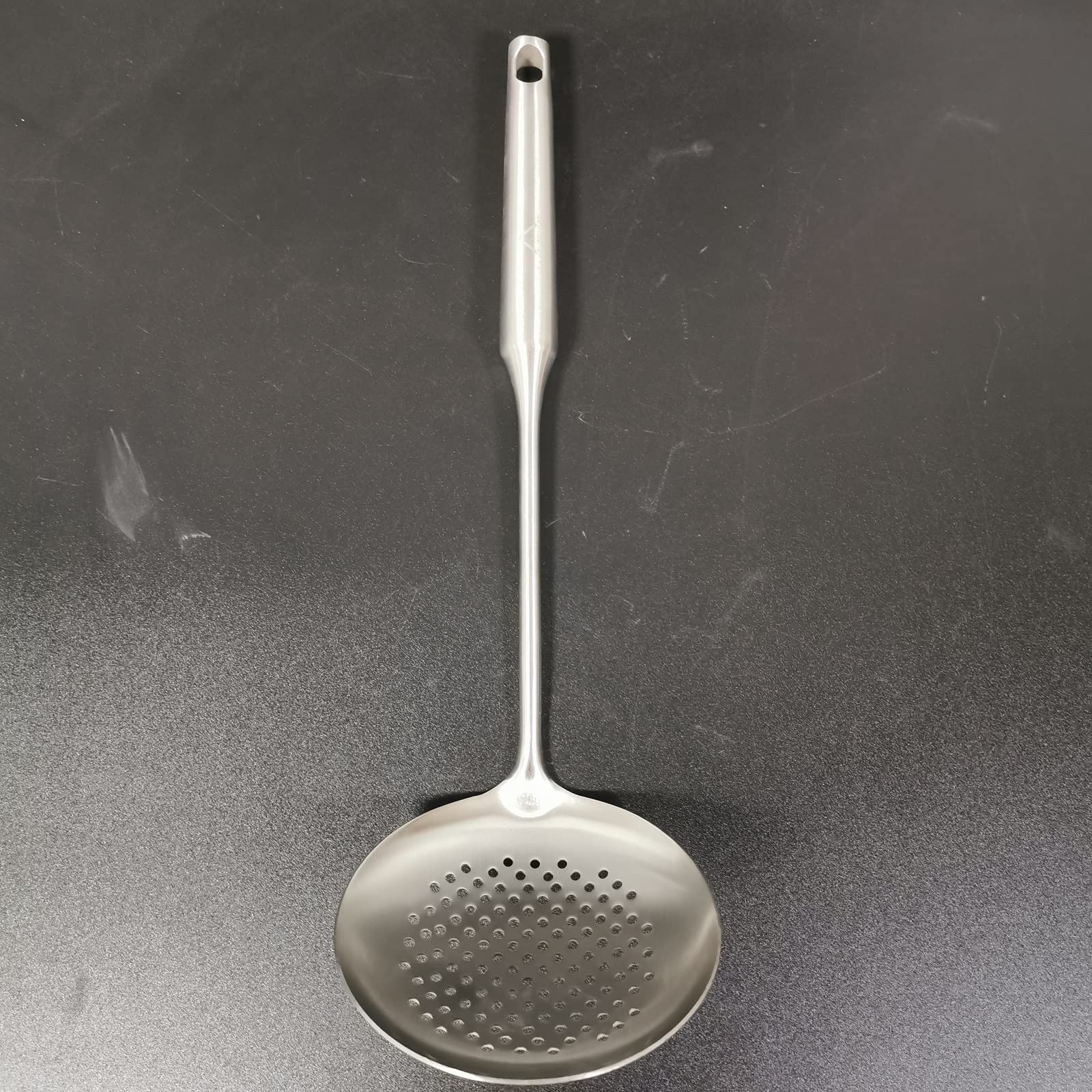A · HOUSEWARE Skimmer everyday cooking essential for soups and pasta.