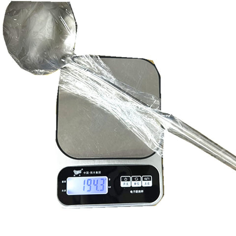 A · HOUSEWARE Stainless steel serving ladle adds a modern touch to meals