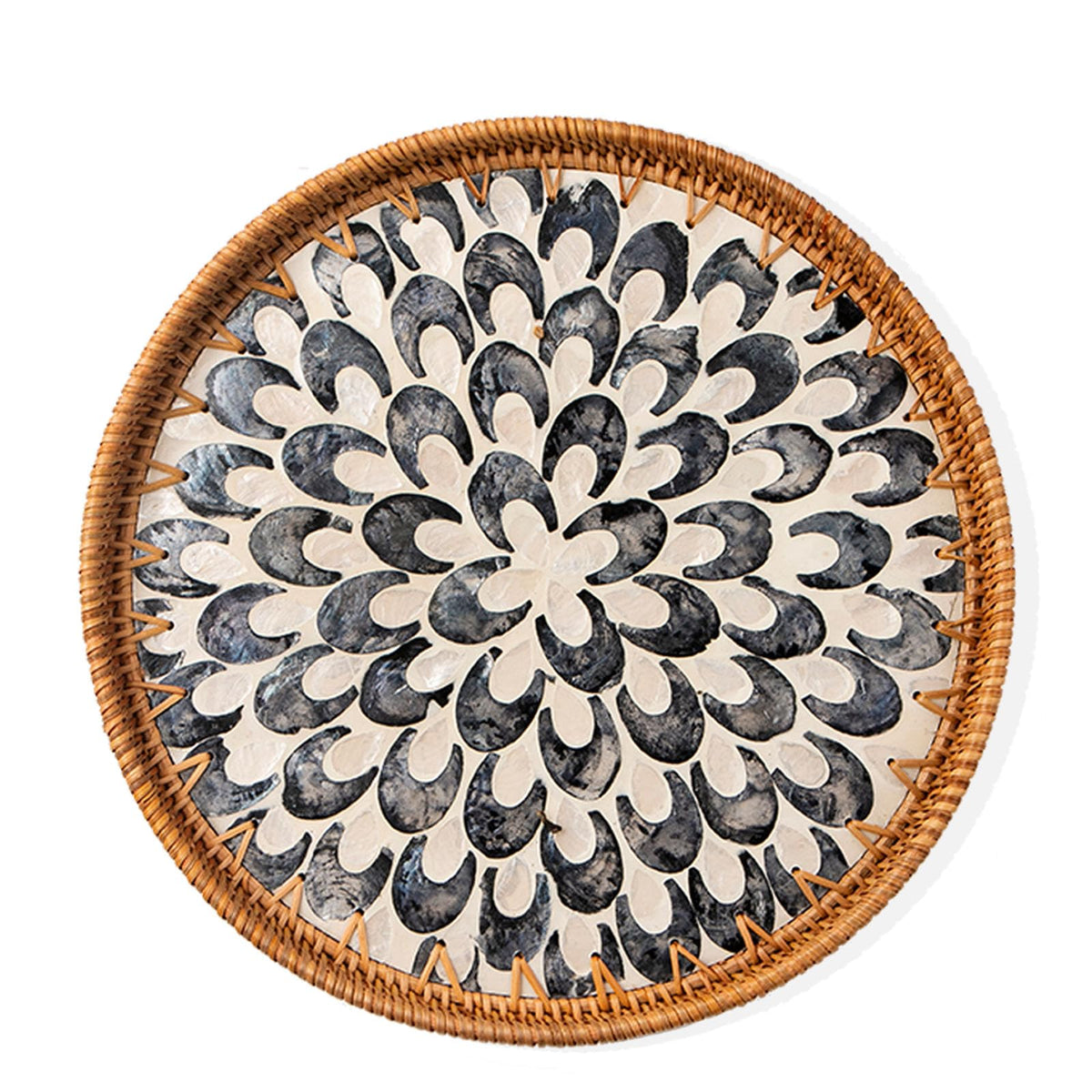 Aayoruro round rattan tray with mother of pearl inlay for an elegant dining display.