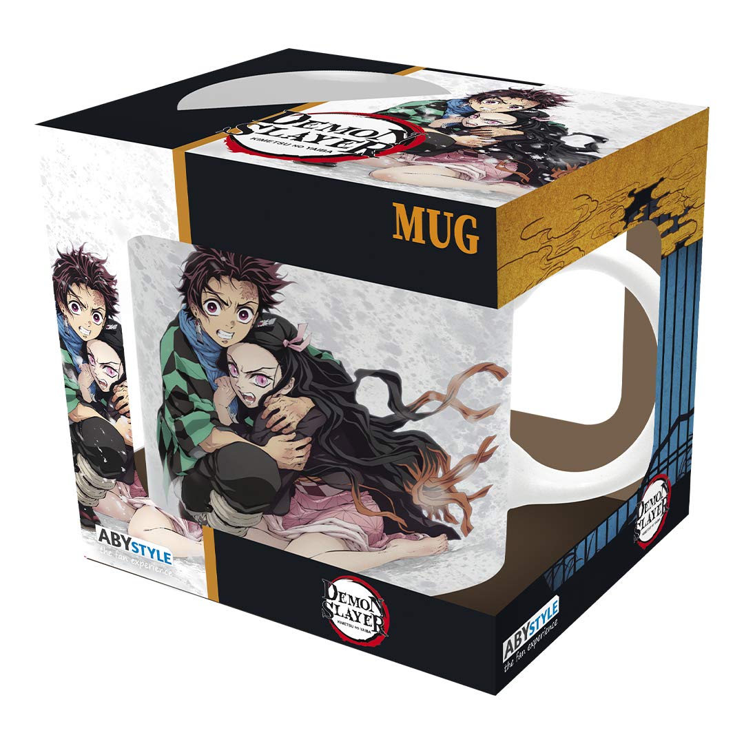 ABYSTYLE Demon Slayer mug in tan used during coffee breaks at the desk.