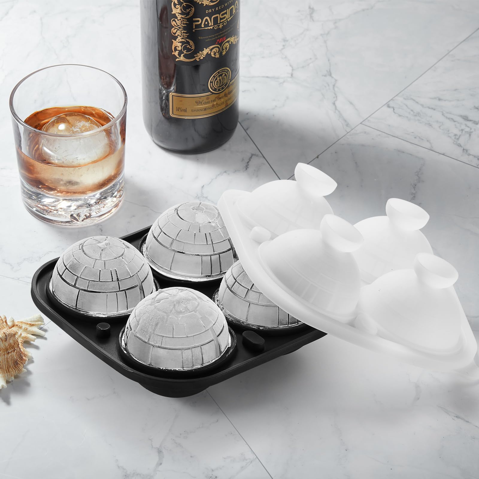 ACOOKEE Large sphere ice cube keeps drinks cool longer.