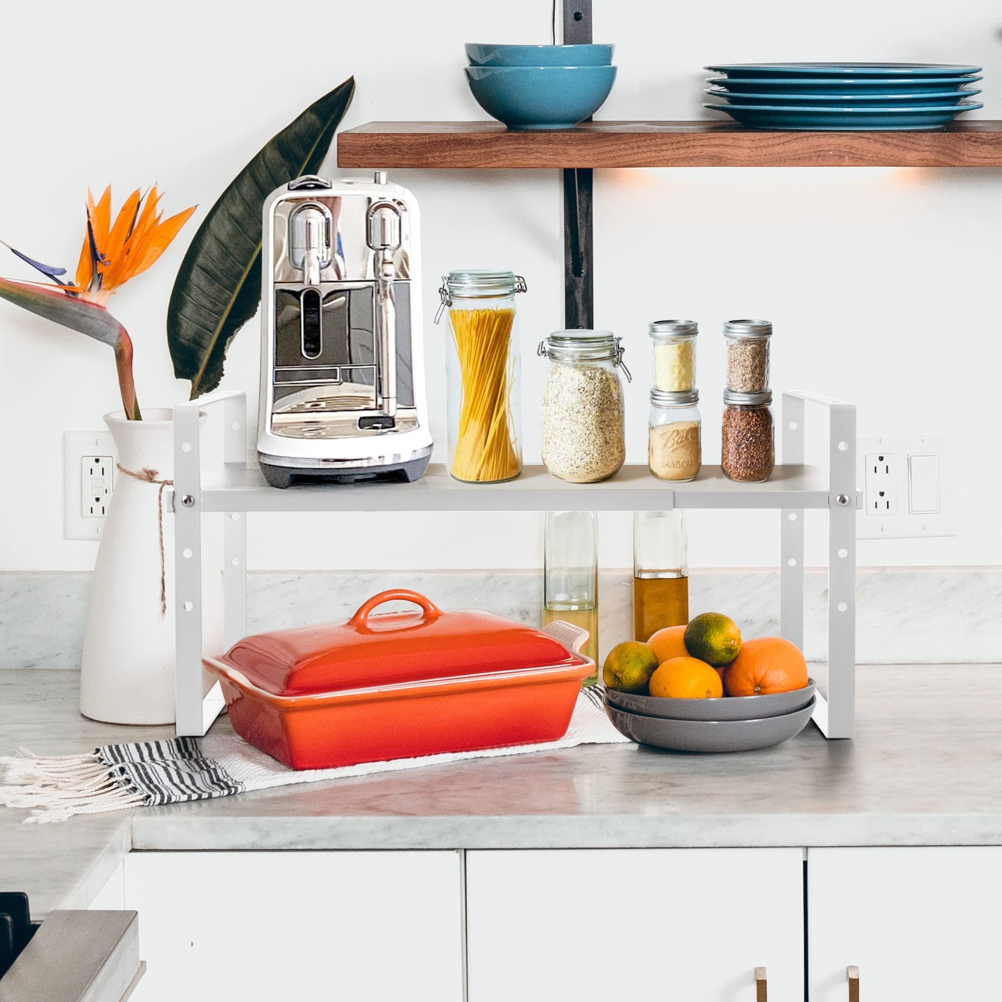 Across-Star stackable-kitchen-rack shows tiered storage for cabinets.