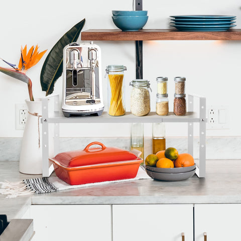 Across-Star stackable-kitchen-rack shows tiered storage for cabinets.