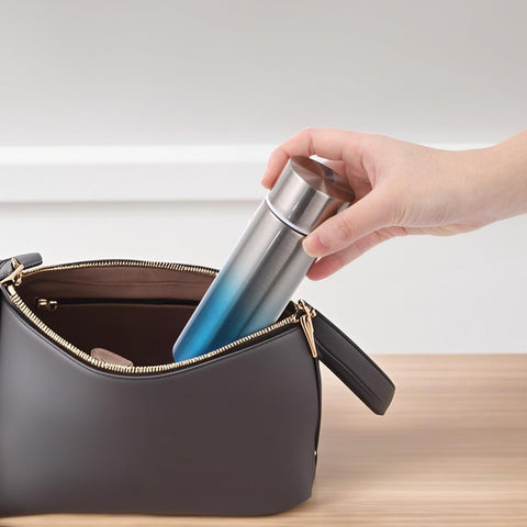 Acshio purse-friendly bottle fits inside a handbag for quick hydration