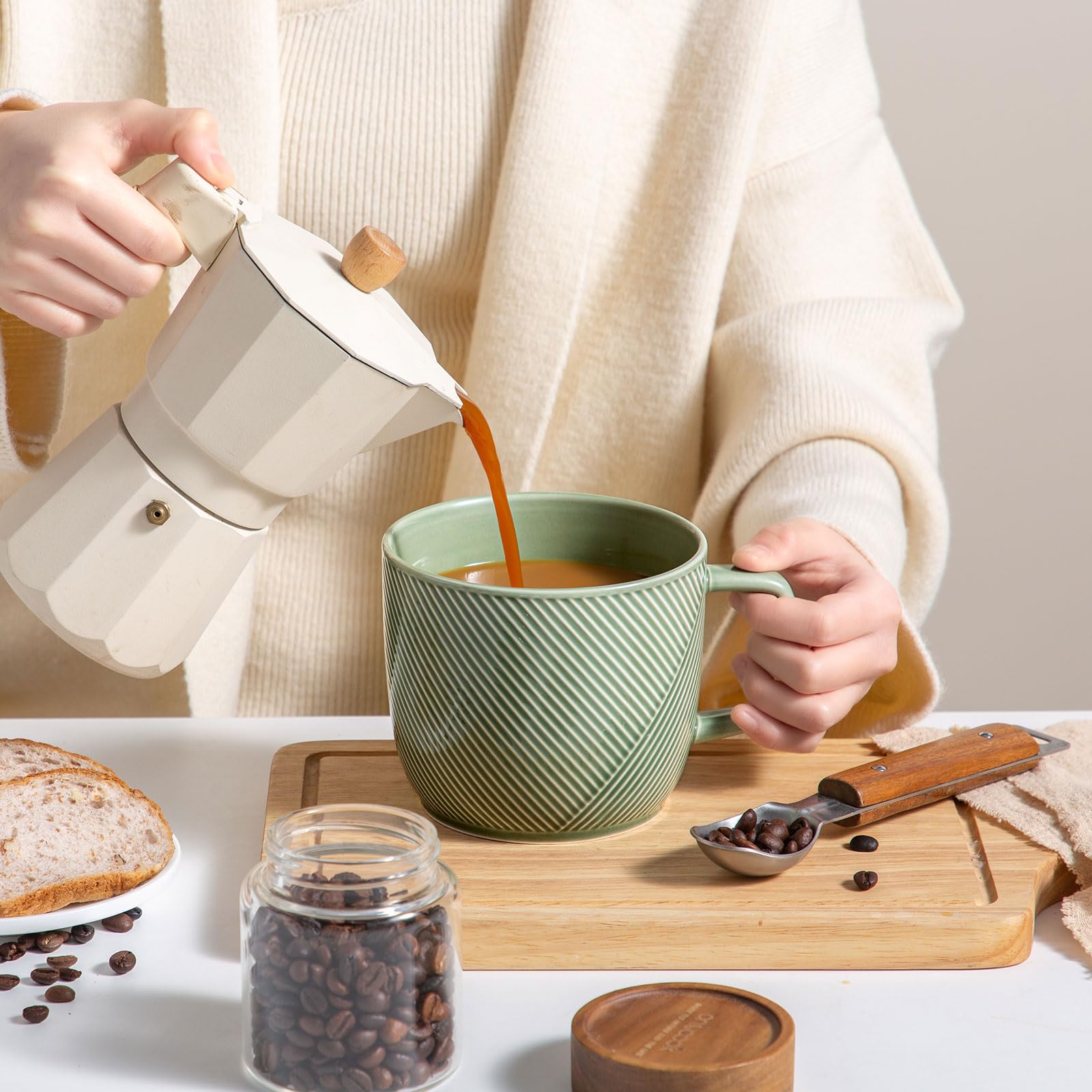 Adewnest green mug with textured surface adds elegance to daily sips.
