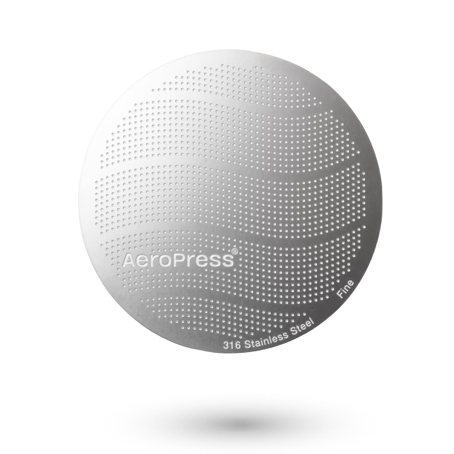 AeroPress 316 stainless steel filter close-up highlights durable, reusable filtration.