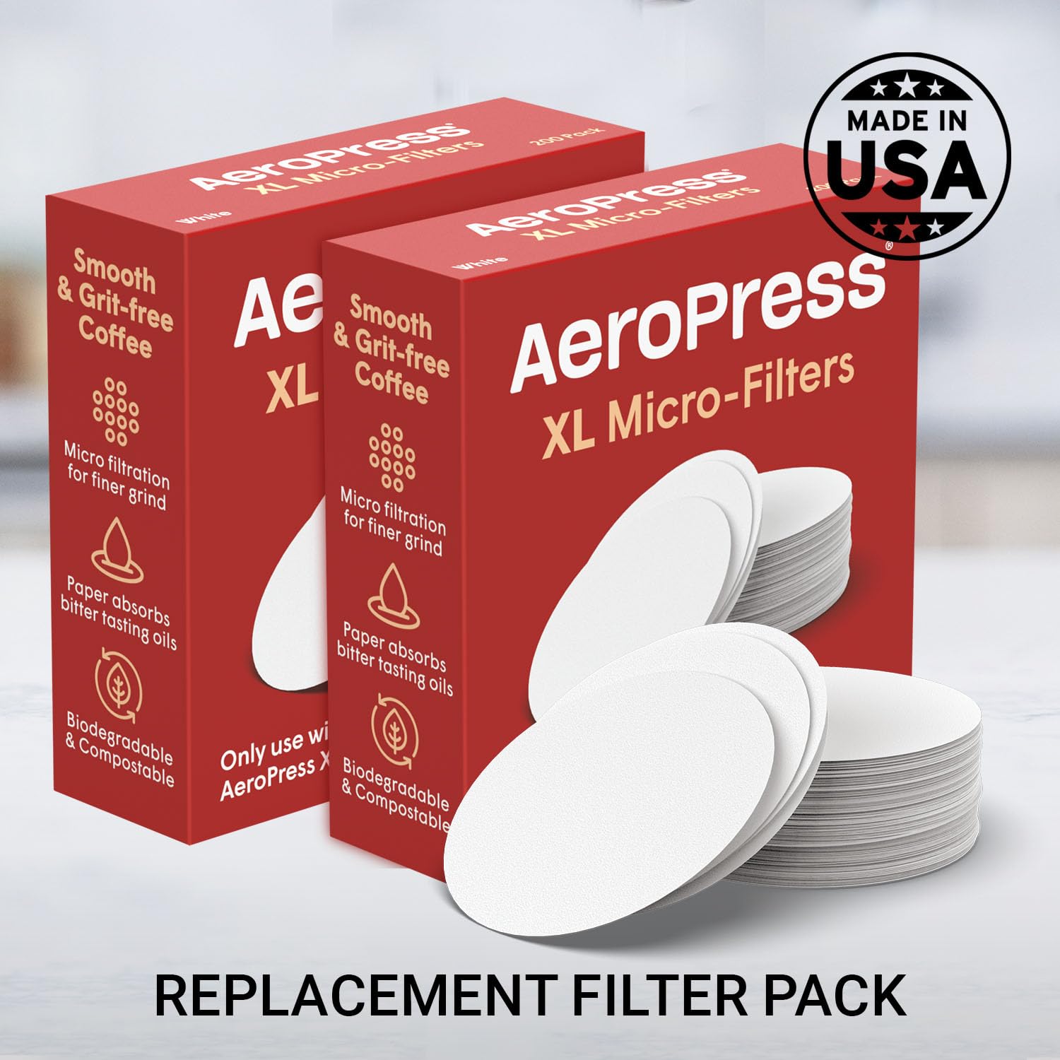 Close-up of compostable white paper micro-filters for AeroPress XL