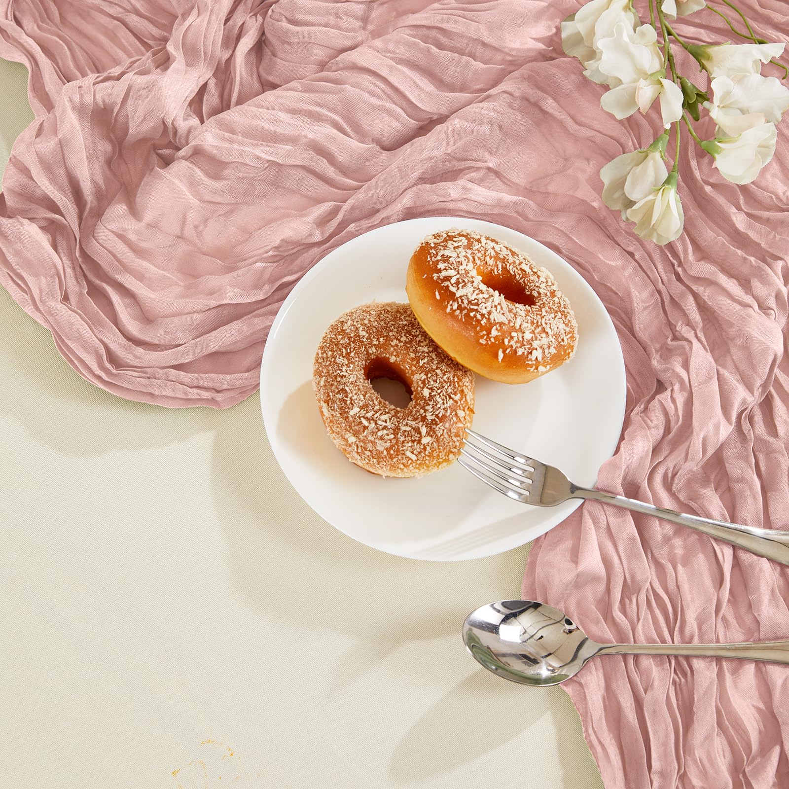 AGIRL cheesecloth runner drapes softly across a banquet table