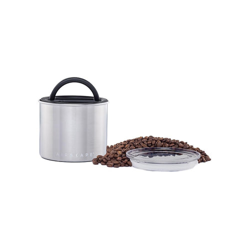 AirScape Planetary Design canister with plunger lid expels air to preserve freshness.