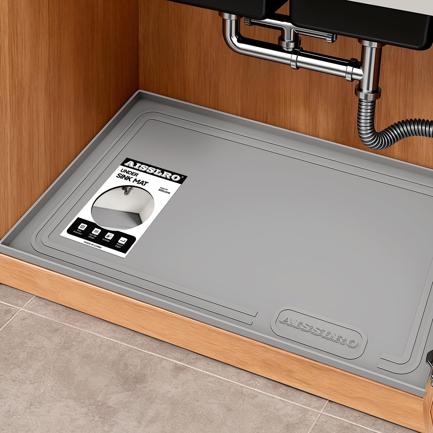 Aisslro under-sink mat with waterproof surface protects cabinets from leaks.