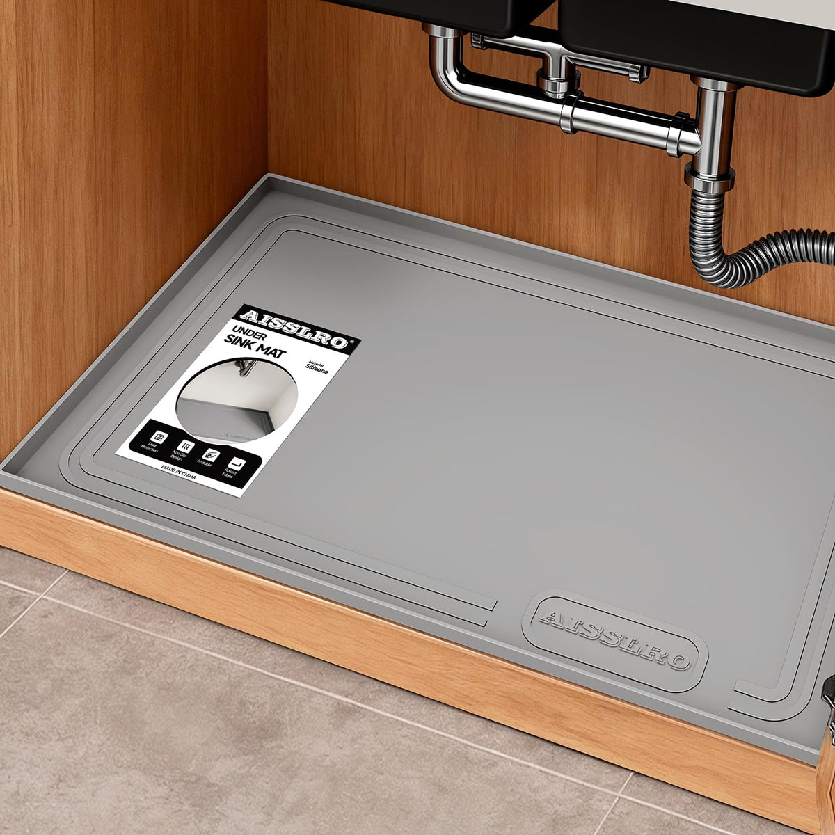 Aisslro under-sink mat with waterproof surface protects cabinets from leaks.