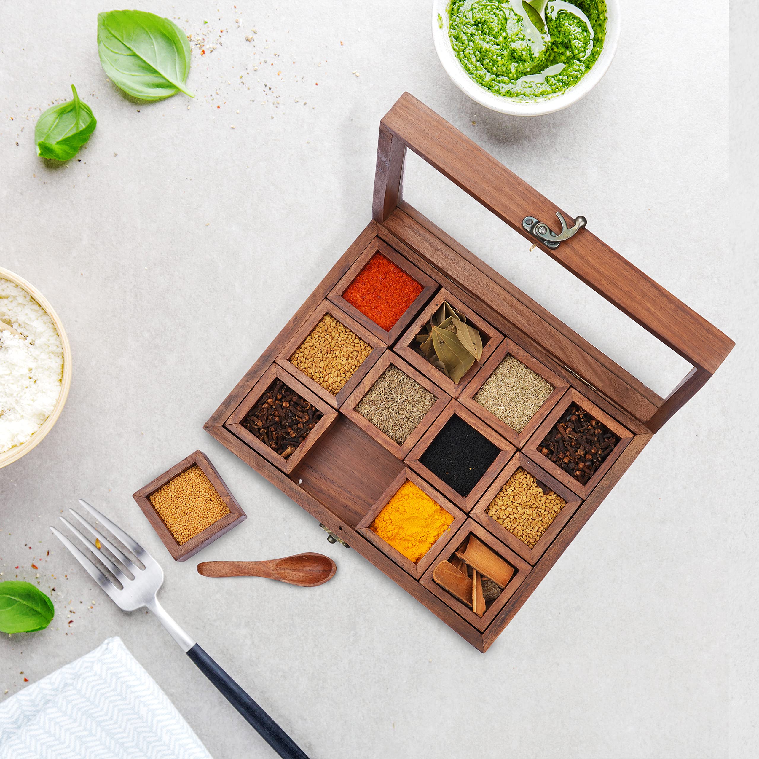 Ajuny masala dabba with 12 compartments keeps spices separated for fresh flavor