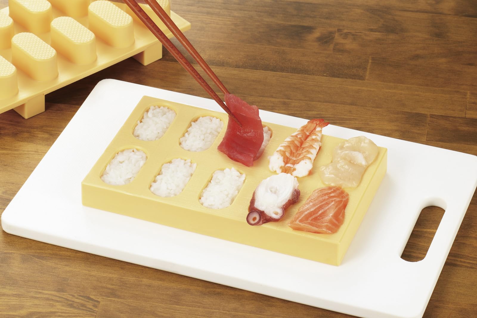 Sushi mold rice-fill area enabling even layers and neat portions.