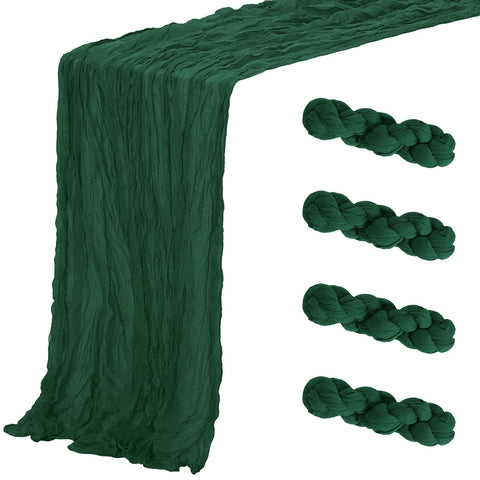 Aktor Emerald Green cheesecloth table runner laid on a dining table for elegant dining setup.
