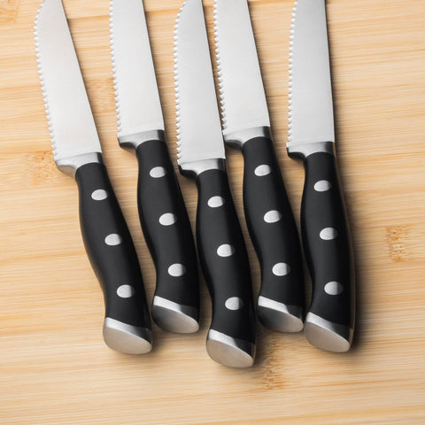 Alata full-tang precision-forged steak knife for strong, balanced control.
