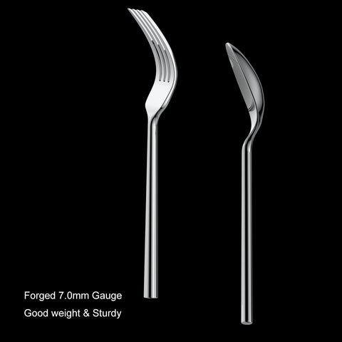 Alata Potter dinner spoon with smooth mirror surface for refined dining.