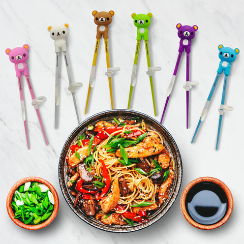 Albino Monkey easy-grip chopsticks support confident toddler handling.