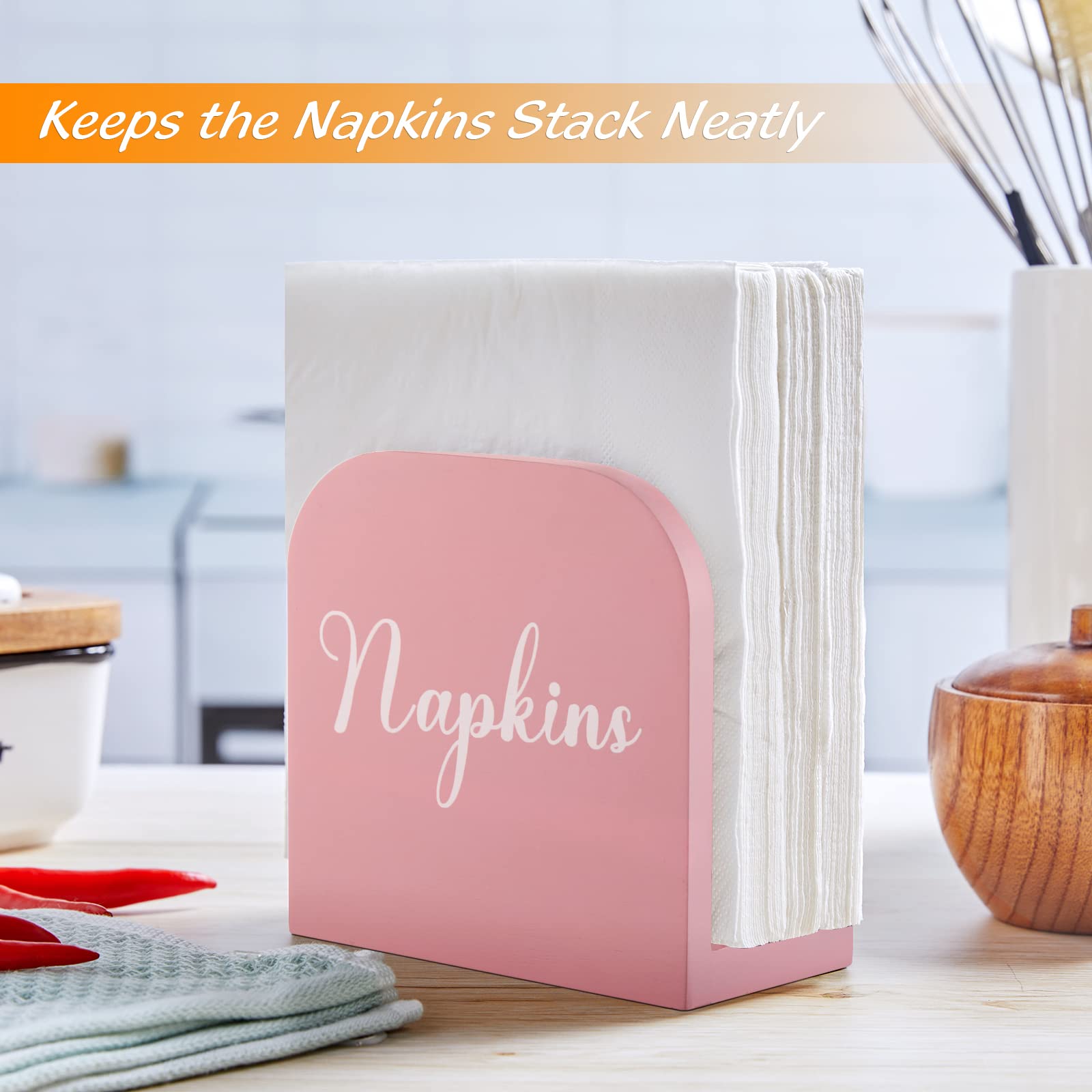 ALELION pink wooden napkin holder on kitchen counter enhances decor and practicality.