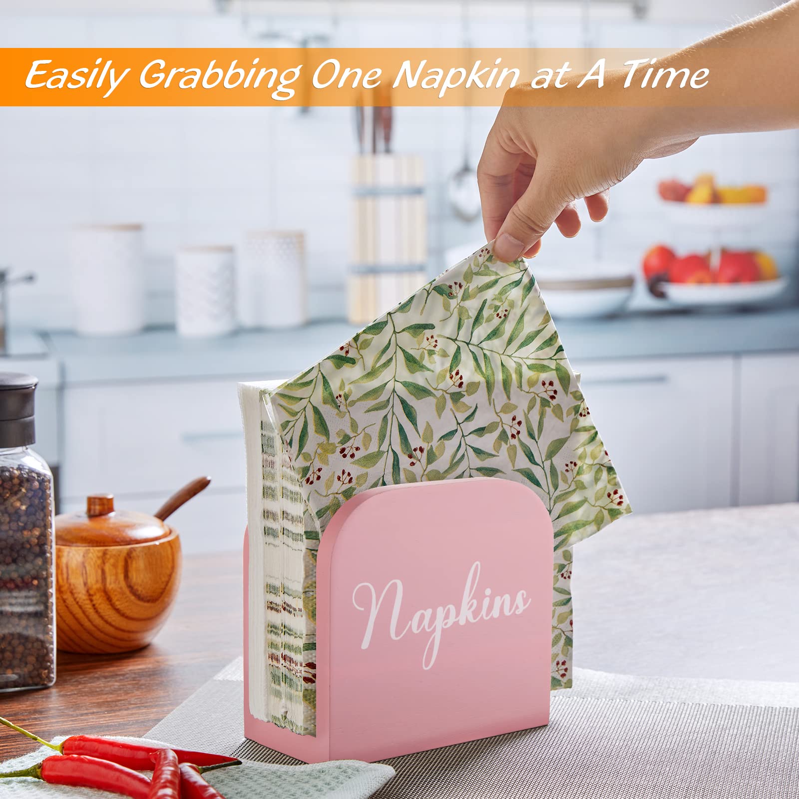 ALELION pink wooden napkin dispenser with stable base for tabletop use.