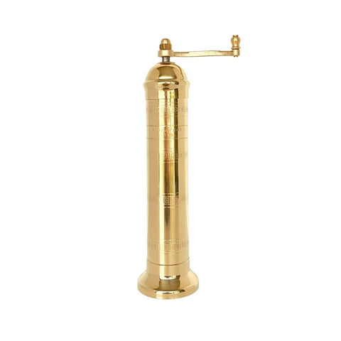Alexander Home The Original European Mill brass 9-inch salt grinder on a table.