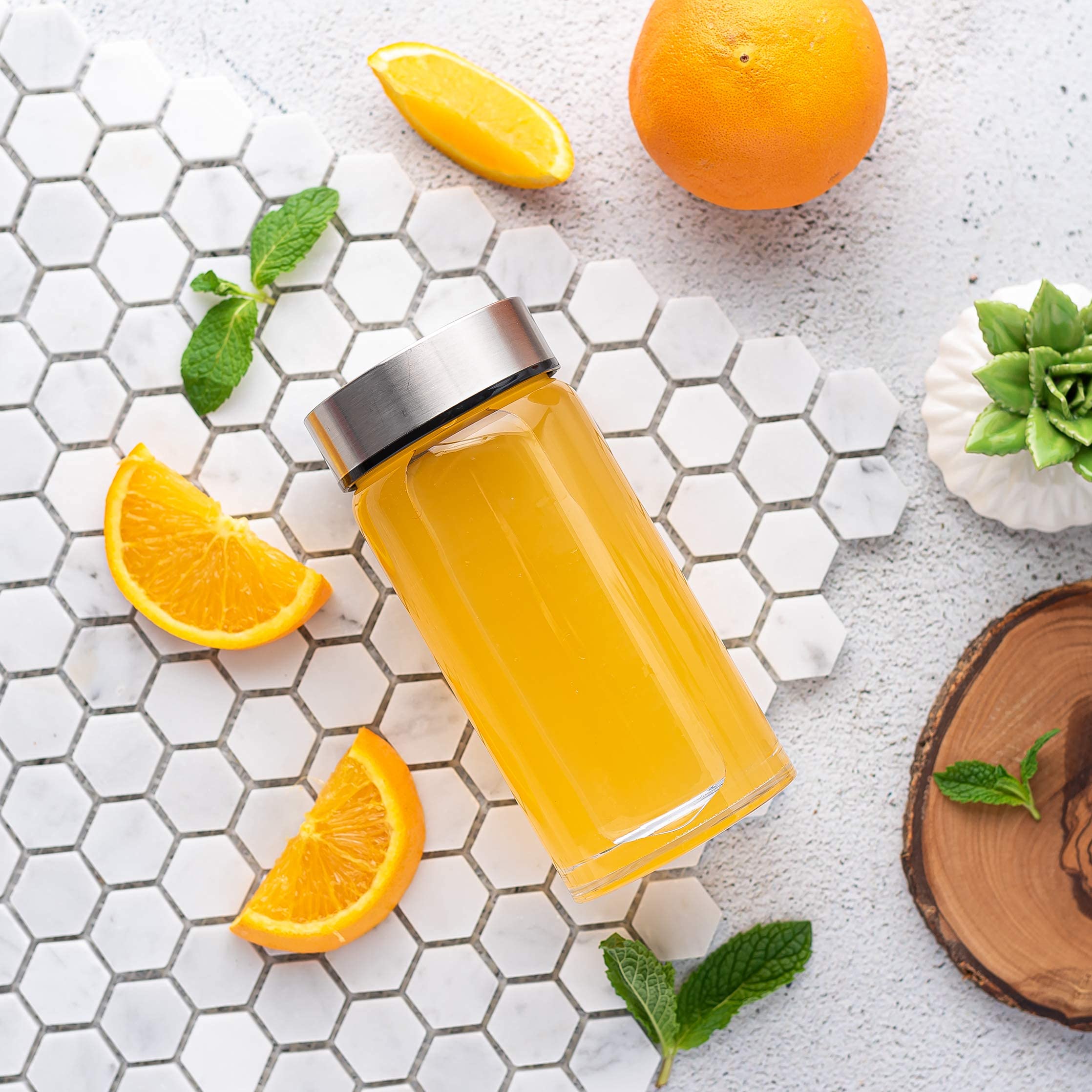 All About Juicing infuses water with fruit and herbs without clogging