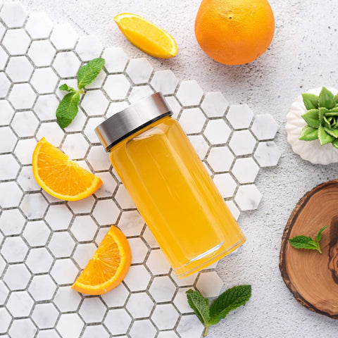 All About Juicing infuses water with fruit and herbs without clogging