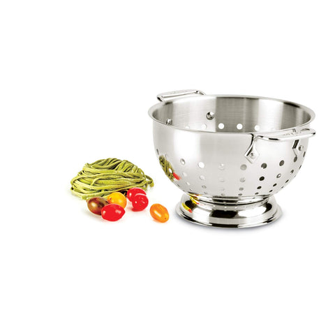 All-Clad colander with large handle for secure rinsing and draining
