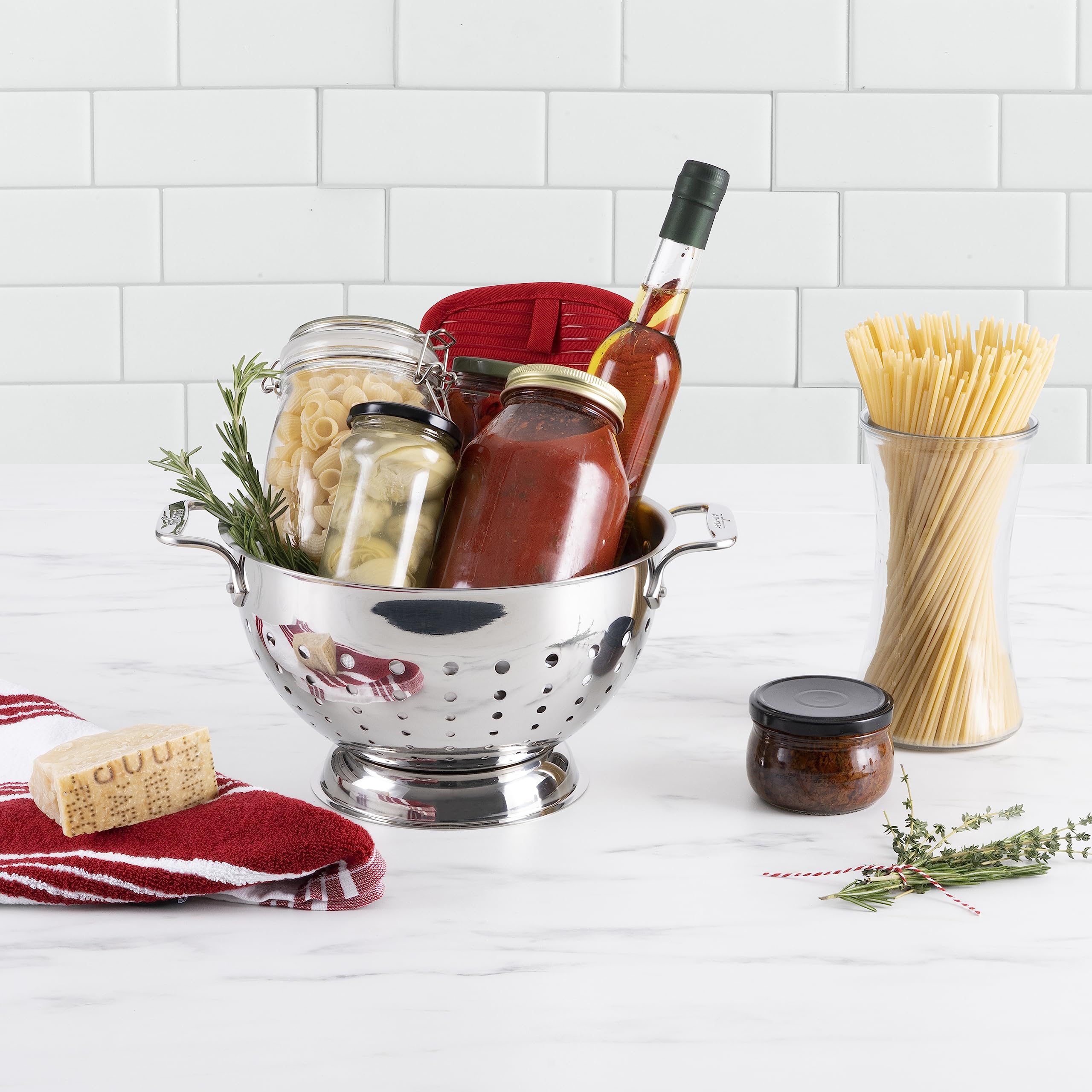 All-Clad colander integrated handles enable safe double boiler use
