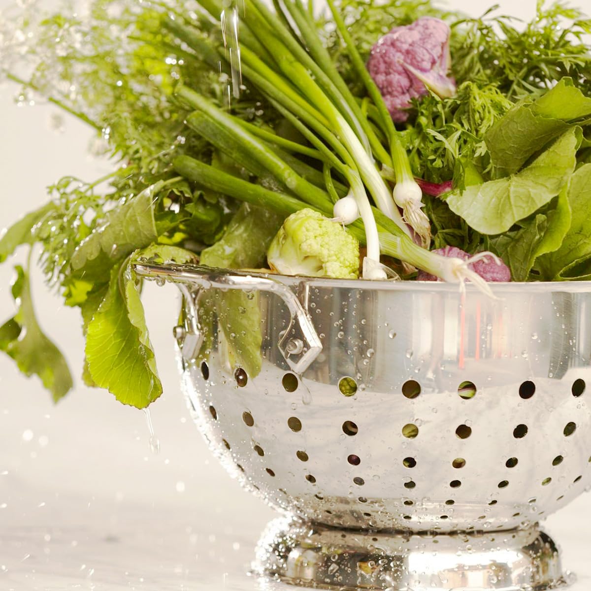 All-Clad colander riveted handles offer a secure grip