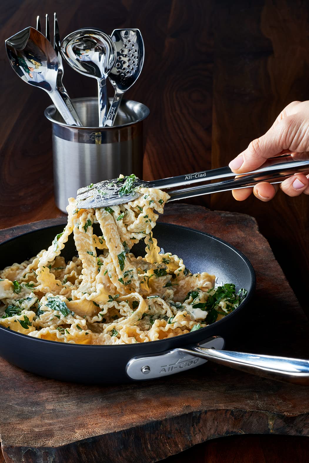 All-Clad Cook and Serve 10-inch tongs ideal for grilling and table sharing.