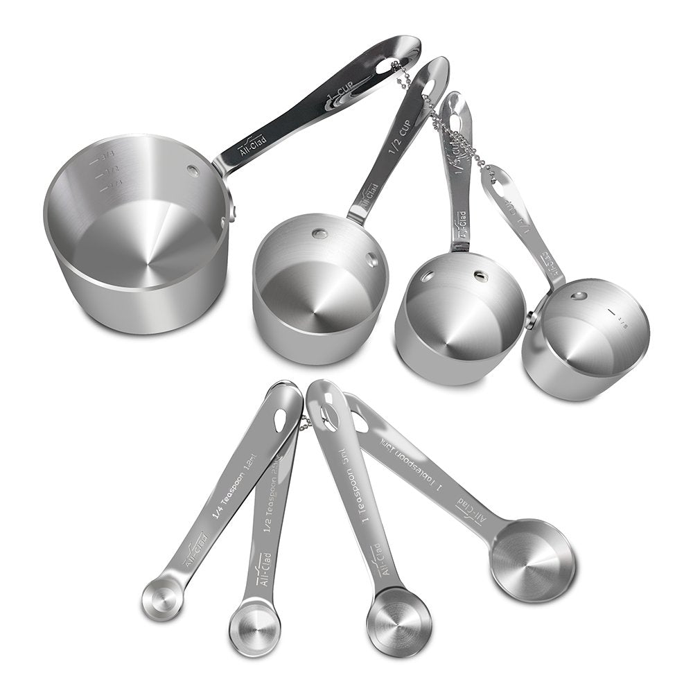 All-Clad measuring cups 1-4cup demonstrate precise liquid measurement for baking.