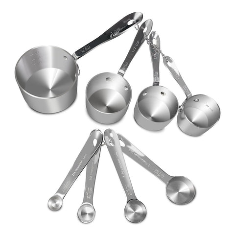 All-Clad measuring cups 1-4cup demonstrate precise liquid measurement for baking.