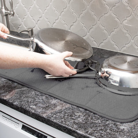 All-Clad absorbent foam padding highlights fast moisture absorption and counter protection.