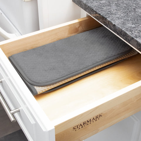 All-Clad dish drying mat machine washable for easy cleaning and quick refresh.