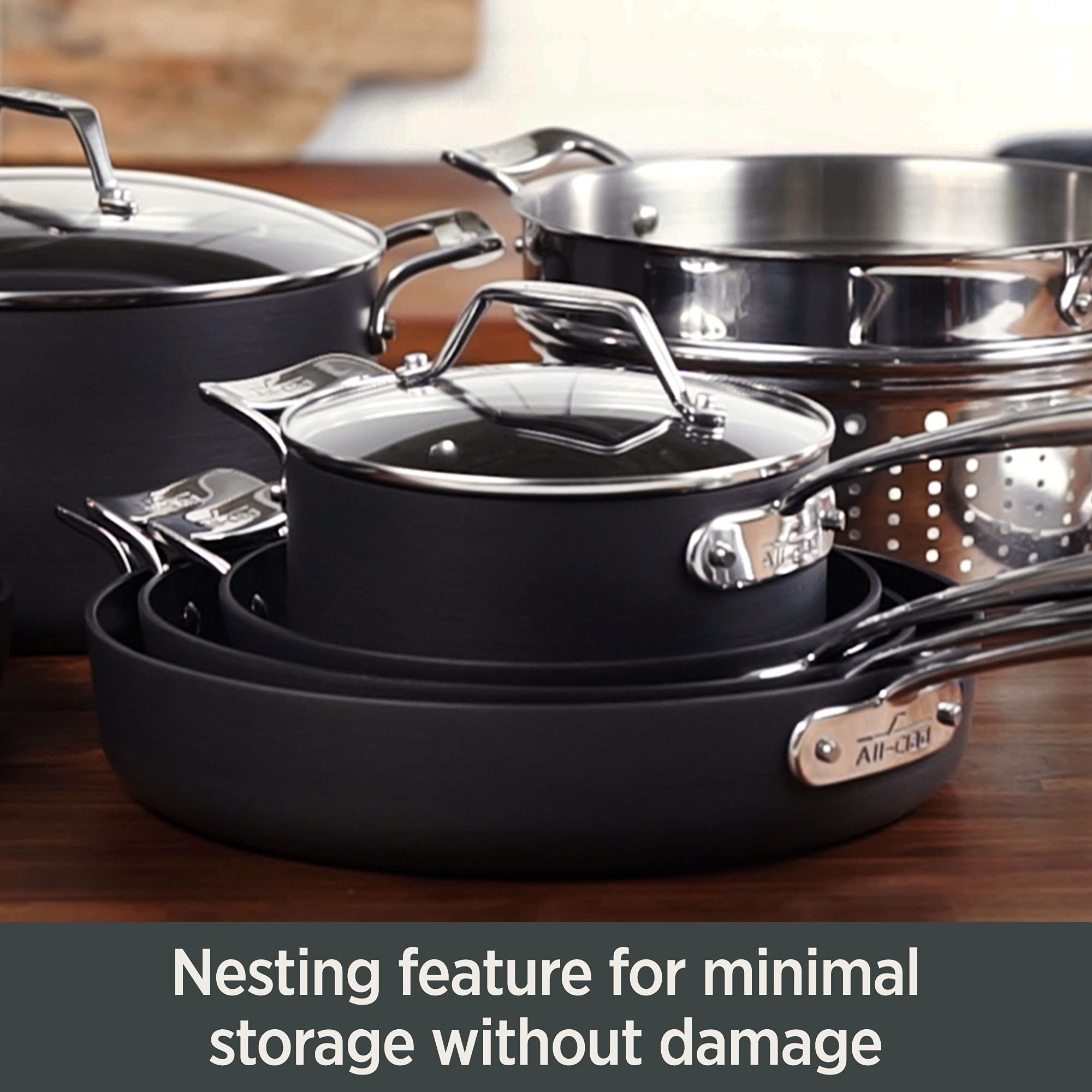 All-Clad Essentials comfort grip handles provide secure lifting.