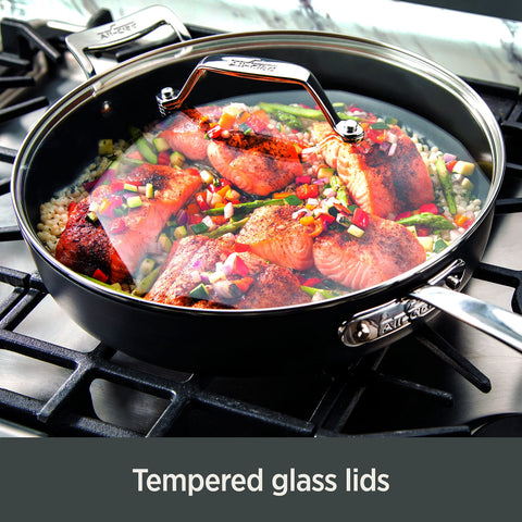 All-Clad Essentials stackable design keeps cookware tidy and protected.