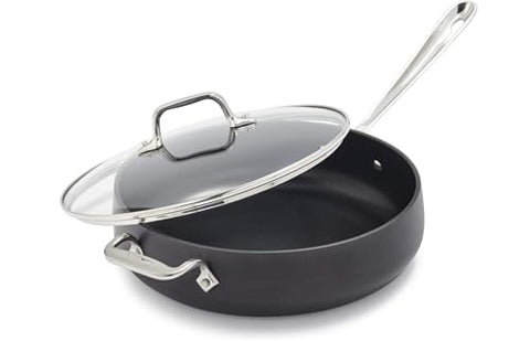 All-Clad HA1 sauté pan front view showing large surface for browning and even heat.