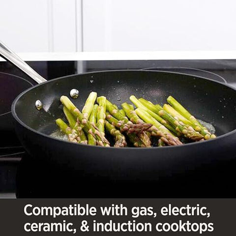 All-Clad HA1 ergonomic handle provides secure grip during sautéing.
