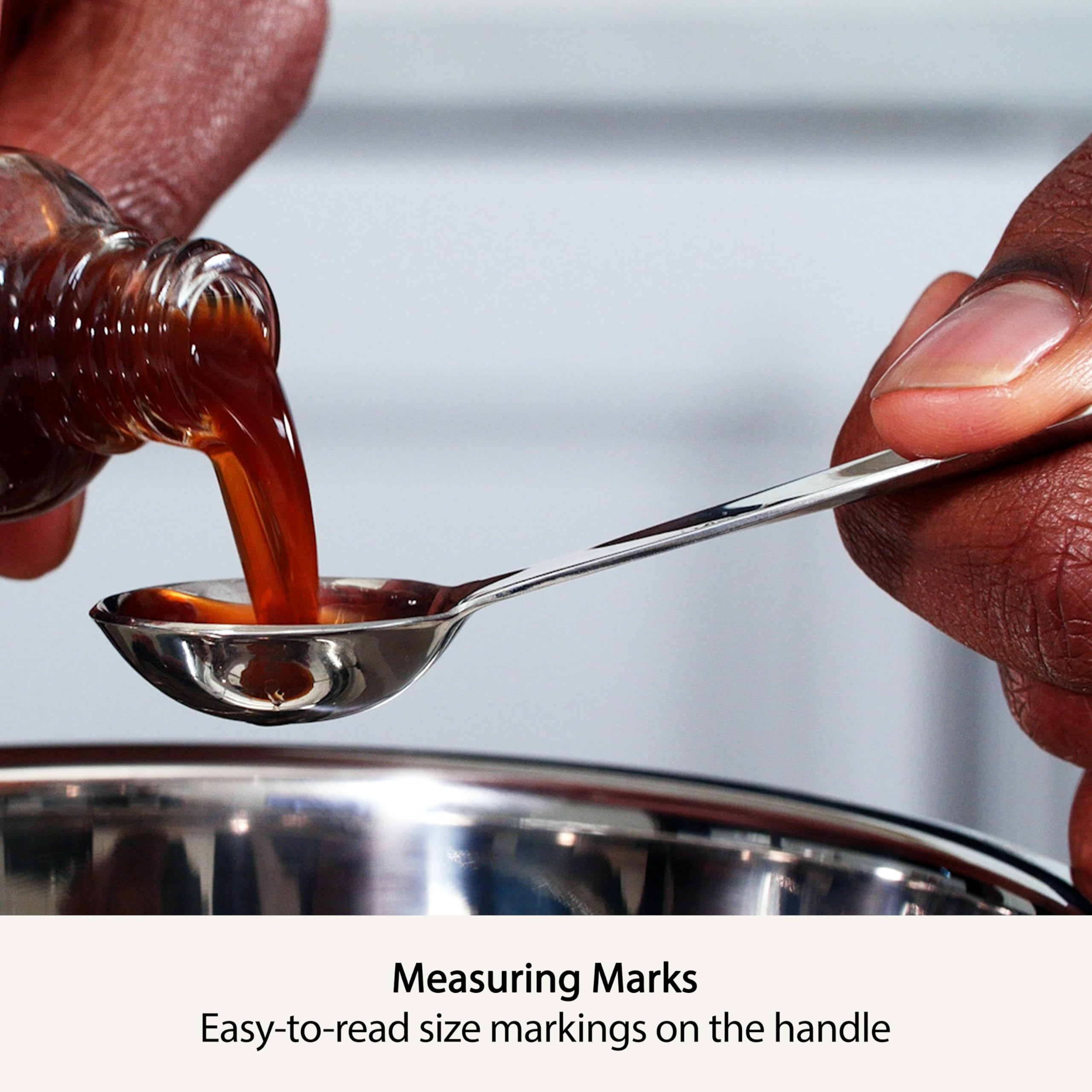 All-Clad stainless steel measuring spoon chain keeps set organized