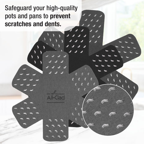 All-Clad non-slip grips on ergonomic silicone handles for a secure hot-pan grip